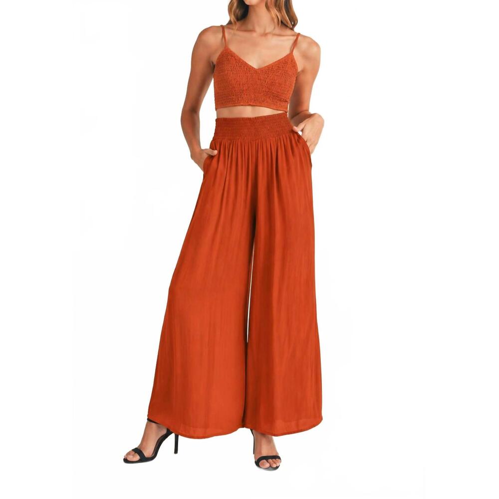 NEW MABLE smocked bralette crop top & wide leg pants set in rust
